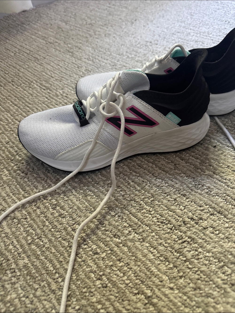 New Balance White Sneakers with Black Collar and Pink Logo